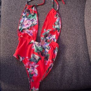 Montce red floral one piece. Size small.